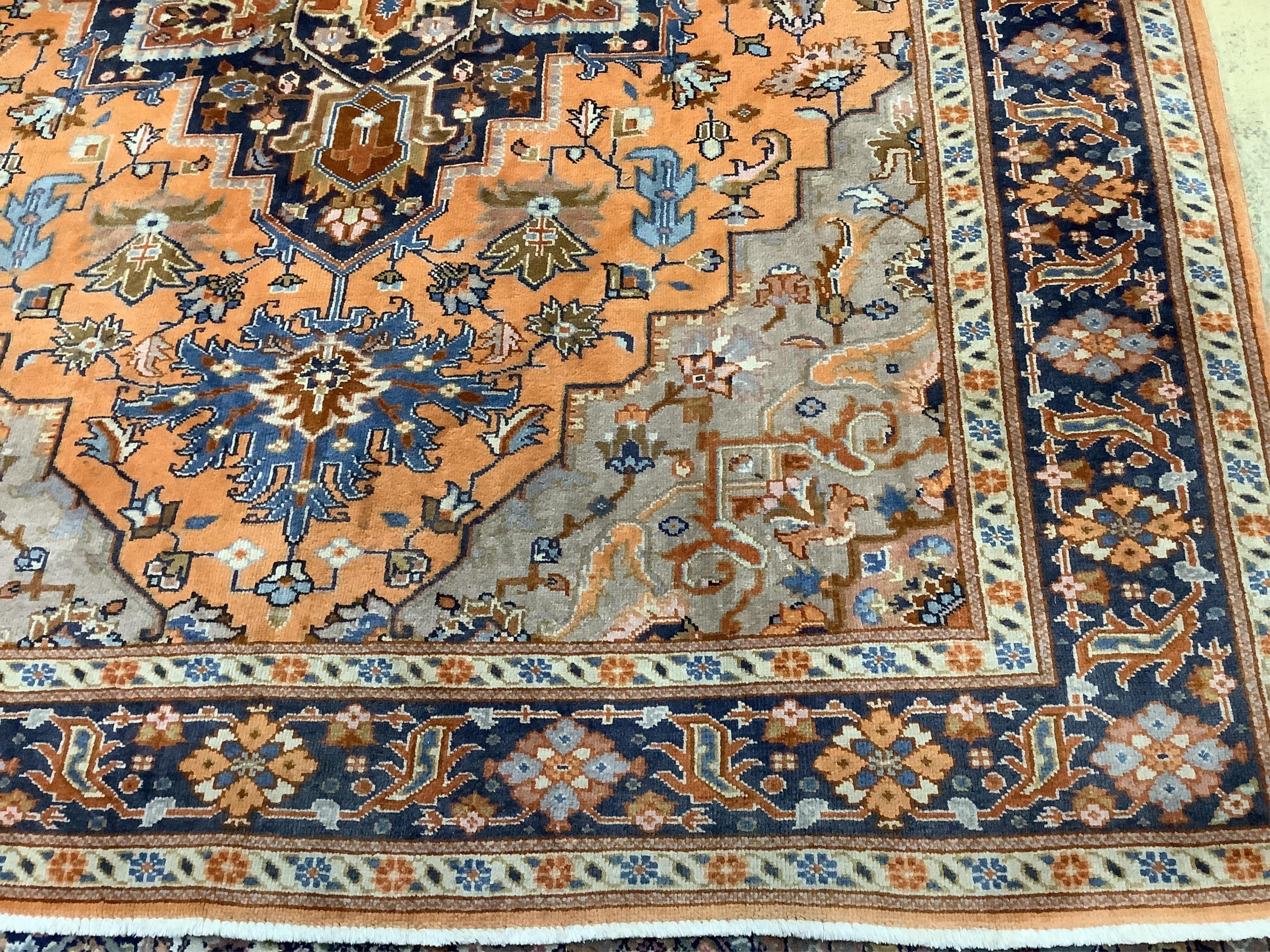 A North West Persian peach ground carpet, 270 x 204cm. Condition - fair